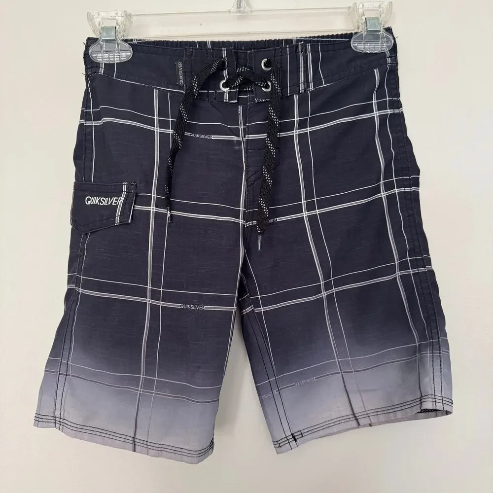Quiksilver Board Shorts Featuring a Black and White Plaid Design